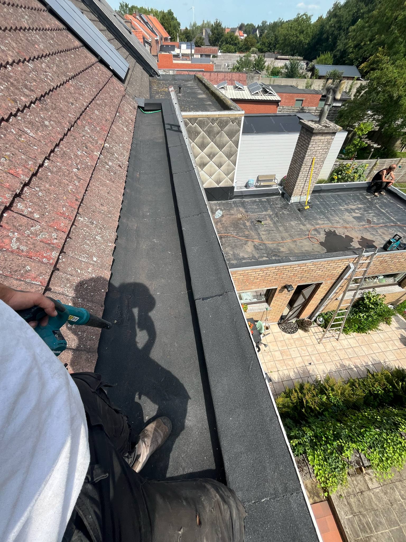 Bakgootrenovatie Gent - nieuwe loden afloop