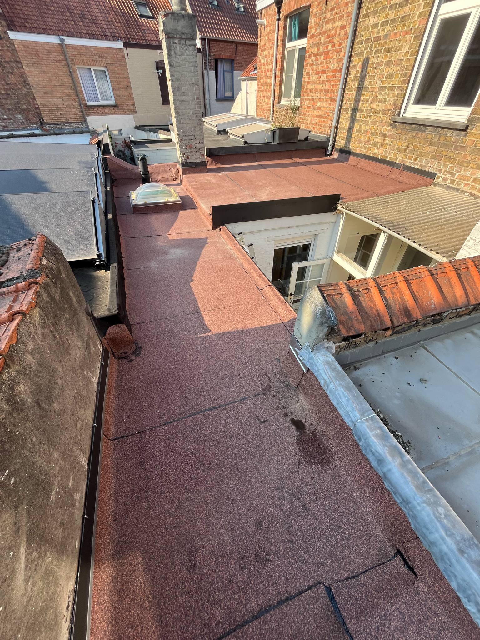 Platdakrenovatie Brugge - eindresultaat met dakkoepel