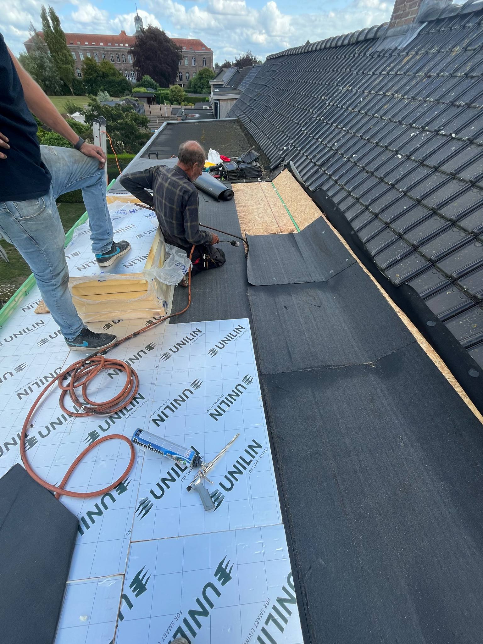 Platdakrenovatie Sint-Laureins - isolatie en dakbedekking