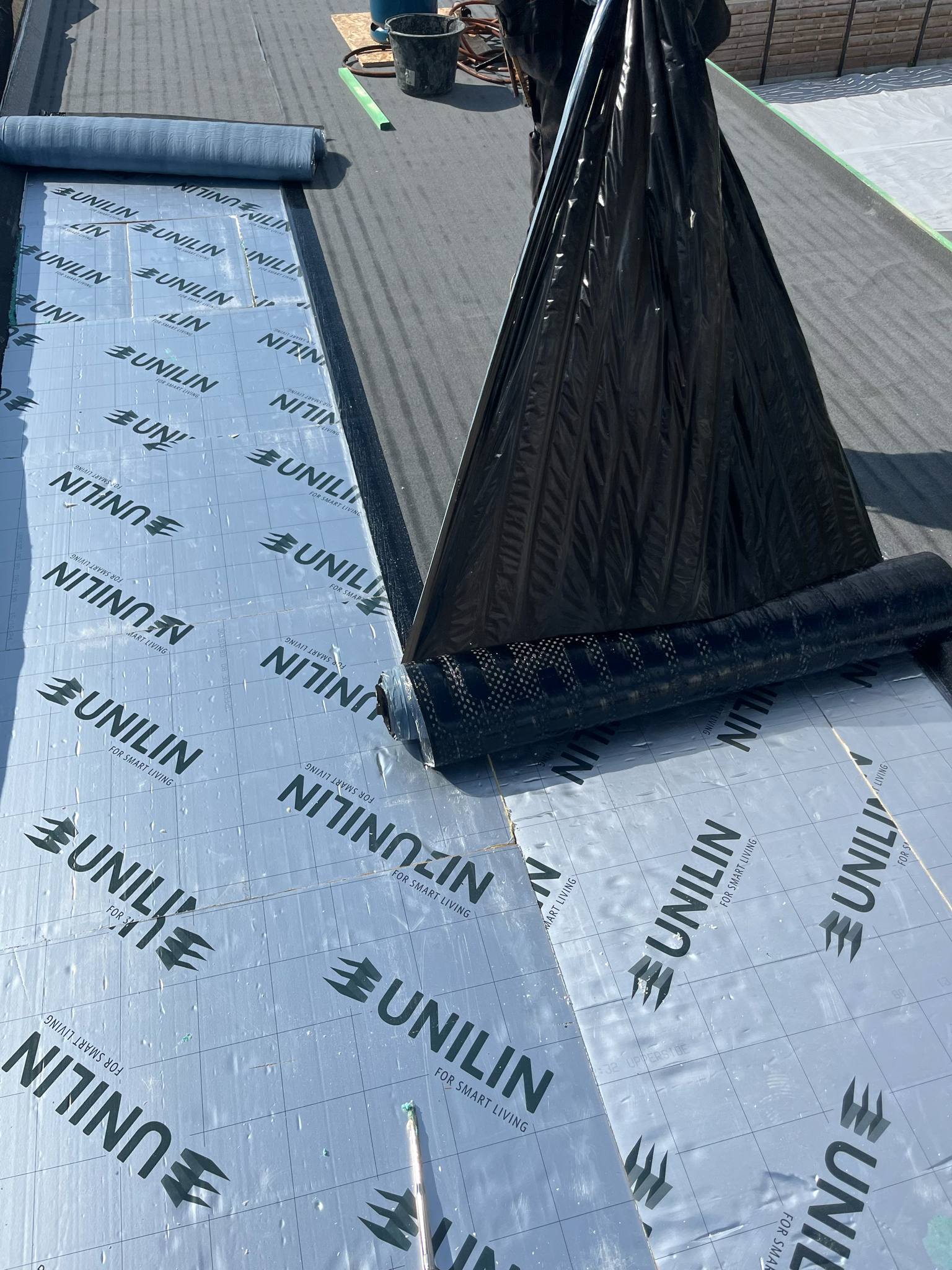 Platdakrenovatie Sint-Laureins - topgevel afwerking